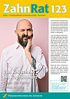 Ein Mann mit Vollbart und ohne Haare hält sich mit der linken Hand die linke Wange und hat Zahnschmerzen. Das Titelbild der Patientenzeitschrift ZahnRat.